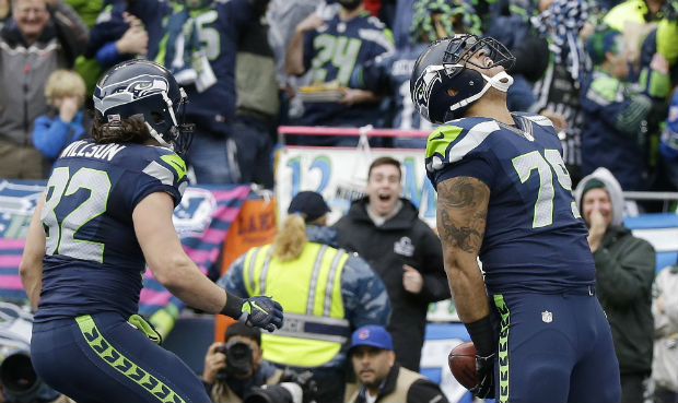 Garry Gilliam’s improbable touchdown helped the Seahawks win the NFC title with with five tur...