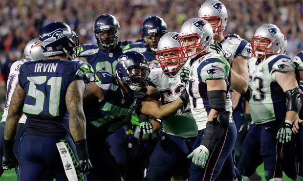 Four players were fined as a result of the scuffle that broke out near the end of the Super Bowl. (...
