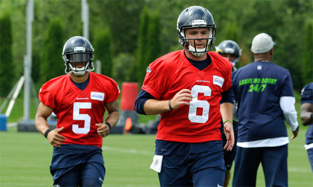 B.J. Daniels (5) and R.J. Archer (6) were the only quarterbacks available for Seattle’s first...