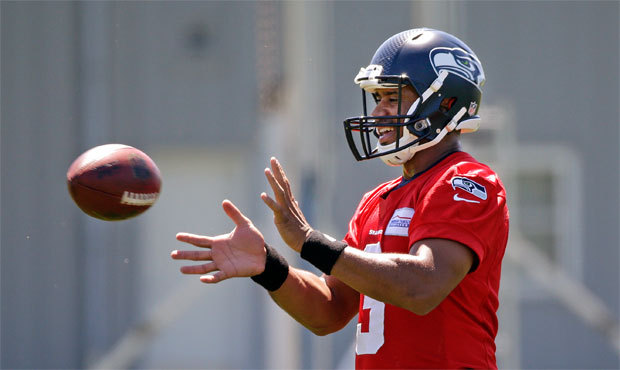 Russell Wilson reportedly plans to take out an insurance policy to protect himself against an injur...