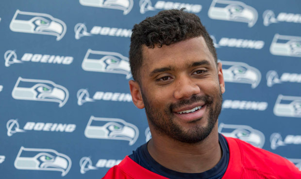 Russell Wilson told John Clayton that he's "always better when I’m busy." (AP)...