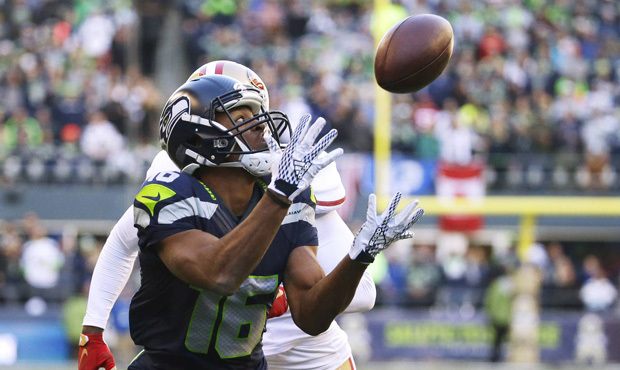 Tyler Lockett hauled in a 24-yard touchdown for the first of his two scores vs. the 49ers on Sunday...