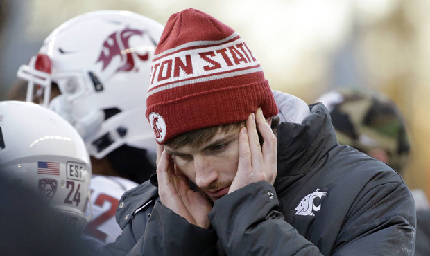 Without the injured Luke Falk at quarterback, WSU committed seven turnovers and lost 45-10 to UW. (...
