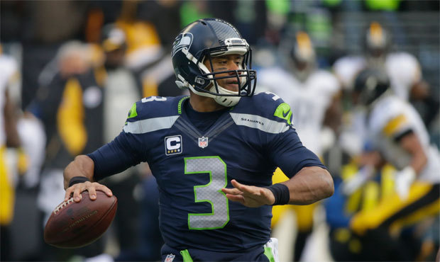 Russell Wilson needed three IVs before the end of Sunday’s win over Pittsburgh to replace los...