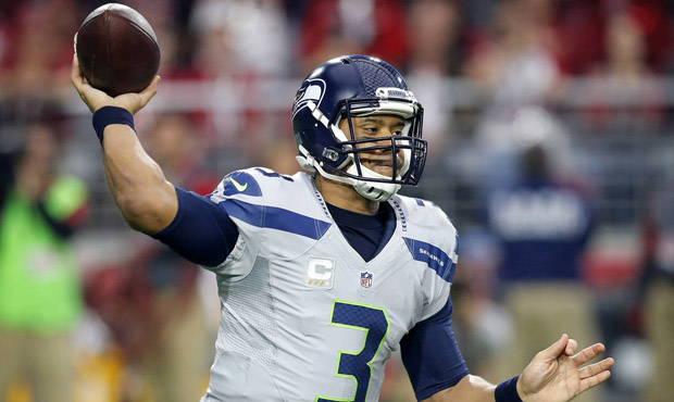 Russell Wilson threw for 34 touchdown passes and 4,024 yards this season, both franchise records. (...