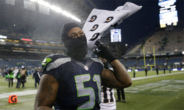 Bruce Irvin and the Seahawks will open the postseason against the Vikings in frigid Minneapolis. (A...