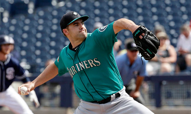 Mariners starter Nathan Karns compared getting his pitch repertoire together with herding sheep. (A...