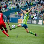 Sounders midfielder Alvaro Fernandez stretches for the ball during the first half. 