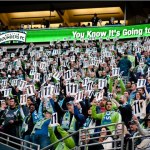 Sounders fans show their support for Steve Zakuani during the 11th minute by holding up the number 11 signs throughout the stadium. 
