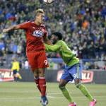 
              Seattle Sounders defender Oniel Fisher, right, and FC Dallas forward David Texeira (9) battle for a header in the first half of an MLS soccer western conference semifinal playoff match, Sunday, Nov. 1, 2015, in Seattle. (AP Photo/Ted S. Warren)
            