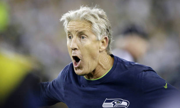 Seattle Seahawks head coach Pete Carroll argues a call during the first half of an NFL football gam...