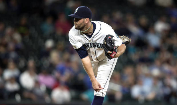 Seattle Mariners’ Tom Wilhelmsen delivers a pitch during the ninth inning of a baseball game ...