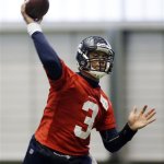 Seattle Seahawks quarterback Russell Wilson passes during NFL football practice, Thursday, Jan. 10, 2013, in Renton, Wash. The Seahawks are scheduled to play the Atlanta Falcons Sunday, in an NFC divisional playoff game. (AP Photo/Ted S. Warren)