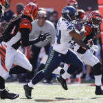Seattle Seahawks running back Thomas Rawls (34) runs for a touchdown in the second half of an NFL football game against the Cincinnati Bengals, Sunday, Oct. 11, 2015, in Cincinnati. (AP Photo/Gary Landers)