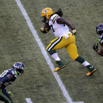 Green Bay Packers' Eddie Lacy runs against the Seattle Seahawks early in the first half of an NFL football game, Thursday, Sept. 4, 2014, in Seattle. (AP Photo/Scott Eklund)