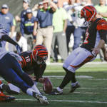 Cincinnati Bengals kicker Mike Nugent (2) boots the winning field goal in overtime of an NFL football game against the Seattle Seahawks, Sunday, Oct. 11, 2015, in Cincinnati. (AP Photo/Frank Victores)