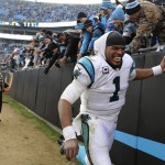 Carolina Panthers quarterback Cam Newton (1) celebrates with fans after the second half of an NFL divisional playoff football game against the Seattle Seahawks, Sunday, Jan. 17, 2016, in Charlotte, N.C. The Panthers won 31-24. (AP Photo/Mike McCarn)