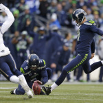 Seattle Seahawks placekicker Steven Hauschka, right, boots a field goal against the St. Louis Rams in the second half of an NFL football game, Sunday, Dec. 28, 2014, in Seattle. (AP Photo/John Froschauer)
