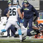 Seattle Seahawks wide receiver Kevin Smith (17) makes a catch against Carolina Panthers defensive back Cortland Finnegan (26) during the second half of an NFL divisional playoff football game, Sunday, Jan. 17, 2016, in Charlotte, N.C. (AP Photo/Chuck Burton)