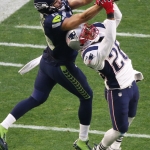 New England Patriots cornerback Logan Ryan (26) breaks up pass to Seattle Seahawks wide receiver Jermaine Kearse (15) during the first half of NFL Super Bowl XLIX football game Sunday, Feb. 1, 2015, in Glendale, Ariz. (AP Photo/Ross D. Franklin)