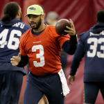 Seattle Seahawks quarterback Russell Wilson (3) runs drills during a team practice for NFL Super Bowl XLIX football game, Friday, Jan. 30, 2015, in Tempe, Ariz. The Seahawks play the New England Patriots in Super Bowl XLIX on Sunday, Feb. 1, 2015. (AP Photo/Matt York)