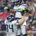 Seattle Seahawks running back Bryce Brown (36) celebrates his touchdown run with teammate Cooper Helfet (84) during the first half of an NFL football game against the Arizona Cardinals, Sunday, Jan. 3, 2016, in Glendale, Ariz. (AP Photo/Ross D. Franklin)
