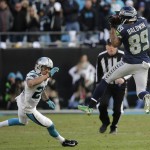 Seattle Seahawks wide receiver Doug Baldwin (89) makes the catch as Carolina Panthers free safety Kurt Coleman (20) looks on during the second half of an NFL divisional playoff football game, Sunday, Jan. 17, 2016, in Charlotte, N.C. (AP Photo/Chuck Burton)