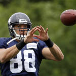 Seattle Seahawks' Jimmy Graham reaches to catch a ball at an NFL football training camp Monday, Aug. 3, 2015, in Renton, Wash. (AP Photo/Elaine Thompson)