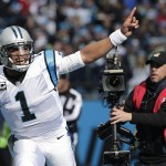 Carolina Panthers quarterback Cam Newton (1) celebrates a Carolina Panthers running back Jonathan Stewart touchdown against the Seattle Seahawks during the first half of an NFL divisional playoff football game, Sunday, Jan. 17, 2016, in Charlotte, N.C. (AP Photo/Chuck Burton)