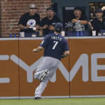 Seattle Mariners left fielder Seth Smith chases a double by San Diego Padres' Yangervis Solarte during the seventh inning of a baseball game Tuesday, June 30, 2015, in San Diego. It was the first hit by the Padres in the game.  (AP Photo/Lenny Ignelzi)
