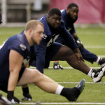 Seattle Seahawks players stretch during a team practice for NFL Super Bowl XLIX football game, Friday, Jan. 30, 2015, in Tempe, Ariz. The Seahawks play the New England Patriots in Super Bowl XLIX on Sunday, Feb. 1, 2015. (AP Photo/Matt York)