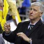 Seattle Sounders coach Sigi Schmid greets fans after the Sounders tied Club America 2-2 in a CONCACAF Champions League soccer quarterfinal, Tuesday, Feb. 23, 2016, in Seattle. (AP Photo/Ted S. Warren)