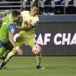 Club America defender Paul Aguilar, right, pushes off Seattle Sounders forward Clint Dempsey during the second half of a CONCACAF Champions League soccer quarterfinal, Tuesday, Feb. 23, 2016, in Seattle. The match ended in a 2-2 draw. (AP Photo/Ted S. Warren)