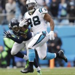 Carolina Panthers running back Jonathan Stewart (28) runs against the Seattle Seahawks during the first half of an NFL divisional playoff football game, Sunday, Jan. 17, 2016, in Charlotte, N.C. (AP Photo/Bob Leverone)