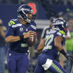 Seattle Seahawks' Russell Wilson (3) prepares to pass against the Dallas Cowboys in the first half of an NFL football game Sunday, Nov. 1, 2015, in Arlington, Texas. (AP Photo/Brandon Wade)