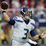 Seattle Seahawks quarterback Russell Wilson (3) throws against the Arizona Cardinals during the first half of an NFL football game, Sunday, Jan. 3, 2016, in Glendale, Ariz. (AP Photo/Ross D. Franklin)