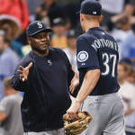 Seattle Mariners manager Lloyd McClendon, left, congratulates starting pitcher Mike Montgomery after the Mariners' 5-0 victory over the San Diego Padres in a baseball game Tuesday, June 30, 2015, in San Diego. Montgomery threw a one-hitter.  (AP Photo/Lenny Ignelzi)