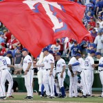 The Texas Rangers celebrate a 3-2 win over the Seattle Mariners after a baseball game, Monday, April 4, 2016, in Arlington, Texas. (AP Photo/Brandon Wade)