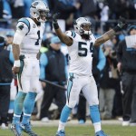 Carolina Panthers outside linebacker Shaq Green-Thompson (54) and Carolina Panthers quarterback Cam Newton (1) celebrate after the second half of an NFL divisional playoff football game against the Seattle Seahawks, Sunday, Jan. 17, 2016, in Charlotte, N.C. The Panthers won 31-24. (AP Photo/Bob Leverone)