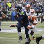 Seattle Seahawks' Derrick Coleman runs with the ball against the Cleveland Browns in the first half of an NFL football game, Sunday, Dec. 20, 2015, in Seattle. (AP Photo/Ted S. Warren)