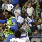 Seattle Sounders forward Oalex Anderson, left, goes for a header against Montreal Impact's Hassoun Camara during the second half of an MLS soccer match, Saturday, April 2, 2016, in Seattle. The Sounders won 1-0. (AP Photo/Ted S. Warren)