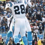 Carolina Panthers quarterback Cam Newton (1) celebrates with Carolina Panthers running back Jonathan Stewart (28) after Stewart scored a touchdown against the Seattle Seahawks during the first half of an NFL divisional playoff football game, Sunday, Jan. 17, 2016, in Charlotte, N.C.(AP Photo/Bob Leverone)