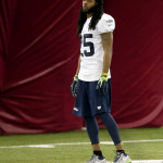Seattle Seahawks' Richard Sherman stretches during a team practice for NFL Super Bowl XLIX football game, Friday, Jan. 30, 2015, in Tempe, Ariz. The Seahawks play the New England Patriots in Super Bowl XLIX on Sunday, Feb. 1, 2015. (AP Photo/Matt York)