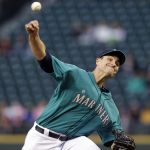 Seattle Mariners starting pitcher Chris Young throws against the San Diego Padres in the fifth inning in a baseball game Monday, June 16, 2014, in Seattle. (AP Photo/Elaine Thompson)