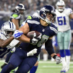 Dallas Cowboys' Byron Jones (31) tackles Seattle Seahawks' Jimmy Graham (88) after Graham caught a pass in the second half of an NFL football game Sunday, Nov. 1, 2015, in Arlington, Texas. (AP Photo/Michael Ainsworth)