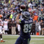 Seattle Seahawks' Doug Baldwin reaches for the ball on a touchdown pass reception against the Cleveland Browns in the first half of an NFL football game, Sunday, Dec. 20, 2015, in Seattle. (AP Photo/Ted S. Warren)