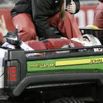 Washington State quarterback Luke Falk (4) gestures as he is carted off the filed after being injured during the second half of an NCAA college football game against Colorado, Saturday, Nov. 21, 2015, in Pullman, Wash. Washington State won 27-3. (AP Photo/Young Kwak)
