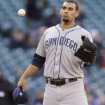 San Diego Padres starting pitcher Tyson Ross gets a new ball after giving up a home run to Seattle Mariners' Brad Miller in the second inning in a baseball game Monday, June 16, 2014, in Seattle. (AP Photo/Elaine Thompson)