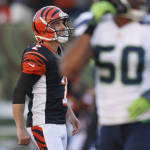 Cincinnati Bengals kicker Mike Nugent smiles after booting the winning field goal in overtime of an NFL football game against the Seattle Seahawks, Sunday, Oct. 11, 2015, in Cincinnati. (AP Photo/Frank Victores)