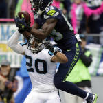 Seattle Seahawks wide receiver Ricardo Lockette (83) makes a touchdown catch above Carolina Panthers free safety Kurt Coleman (20) in the second half of an NFL football game, Sunday, Oct. 18, 2015, in Seattle. (AP Photo/Stephen Brashear)